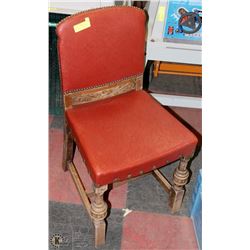 BURNT ORANGE LEATHER STUDDED CHAIR.