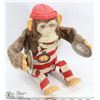 Image 1 : VINTAGE ANIMATED MONKEY.