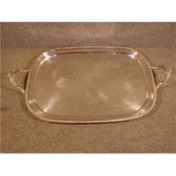 Un plateau rectangulaire d'époque George IV en argent gravé godronné, poinçons de Londres, 1825,...