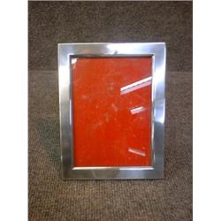 Un encadrement de photo américain en argent....