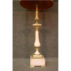 Une lampe en albâtre à décor de bronze doré....
