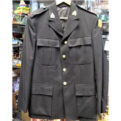 1960's era RCMP brown Tunic all original badges and buttons size 40