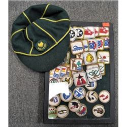 1960's era Scouting Cub hat, made of wool & 40+ scouting badges of the same era.