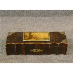 Un coffret de la fin du 19e Siècle en bois à montures de laiton, le couvercle orné d'une marine....