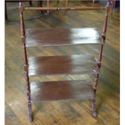 Un bureau-bibliothèque en acajou, vers 1840, la corniche moulurée au-dessus de deux portes vitrée...