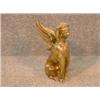Image 1 : Un sphinx en bronze patiné (une aile fendue)....