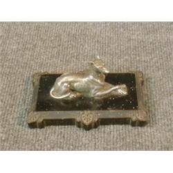 Un presse-papier victorien orné d'une levrette en bronze argenté reposant sur une base sculptée e...