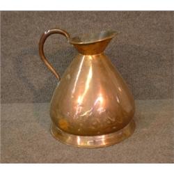 Un pot à mesurer du 19e Siècle en cuivre, d'une contenance de 2 gallons....