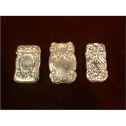 Un lot de 3 étuis à allumettes américains Art Nouveau en argent....