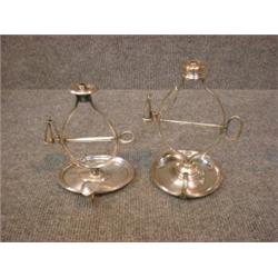 Deux lampes à mèche en métal argenté, l'une Sheffield, vers 1830....