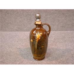 Un broc en porcelaine "Kingsware" de Royal Doulton: "Tony Weller, Beware of the Vidders", avec un...