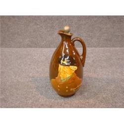 Un broc en porcelaine "Kingsware" de Royal Doulton: "Sporting Squire", avec son bouchon d'origine...