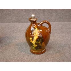 Un broc en porcelaine "Kingsware" de Royal Doulton: "Bonnie Prince Charlie", avec son bouchon ori...