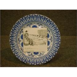 Une assiette en porcelaine de Royal Doulton de la série "Gibson Girls": "She becomes a trained nu...