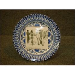 Une assiette en porcelaine de Royal Doulton de la série "Gibson Girls": "The day after arriving a...