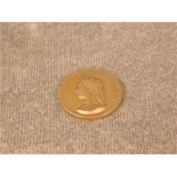 Une médaille en bronze patiné à l'effigie de la Reine Victoria frappée à l'occasion de l'accessio...