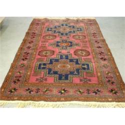 Un tapis Beluchi.  A Beluchi rug.  7'2" x 4'8" - 2.18M x 1.42M. $350/450...