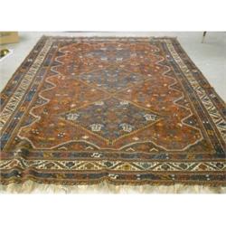Un tapis persan.  A Persian rug.  10'10" x 7'2" - 3.30M x 2.20M. $300/400...