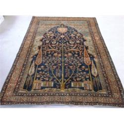 Un tapis Sarouk ancien.  An antique Sarouk rug.  6'5" x 4'2" - 1.97M x 1.27M. $1500/2000...
