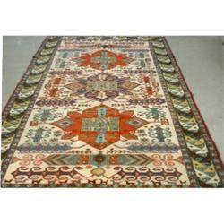 Un tapis Ardebil.  An Ardabil rug.  5'5" x 9'2" - 1.65M x 2.80M. $600/800...