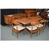 Image 1 : Mid century modern teak dining set including drop leaf table, six chairs with upholstered seats, and