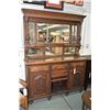 Image 1 : Antique sideboard with raised panel carved doors, six mirrored tall backboard with turned and carved
