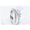 Image 2 : Ladies 14kt white gold and diamond engagement ring set with center 0.65ct Canadian diamond and 0.21c