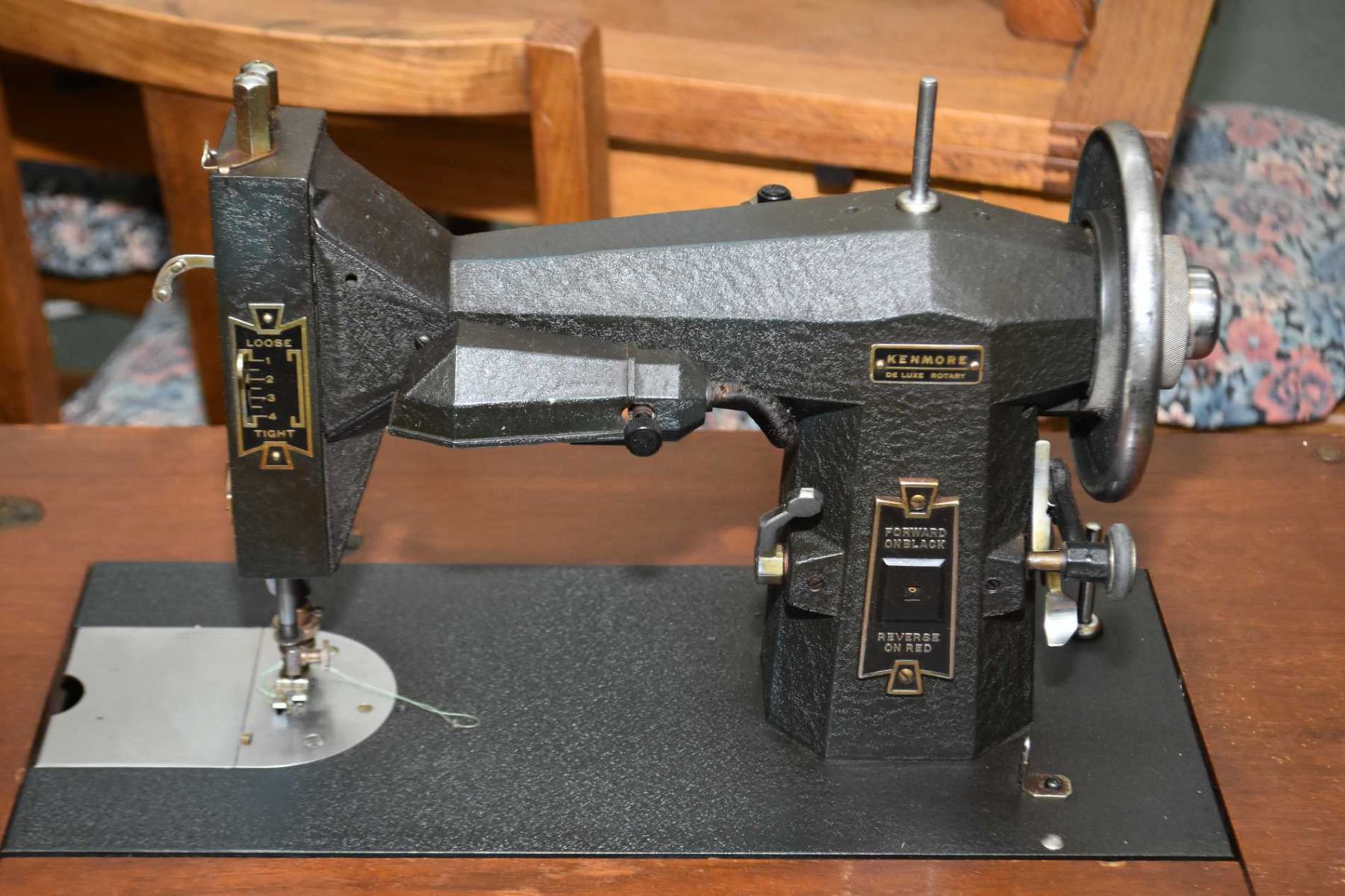Vintage Kenmore Deluxe Rotary sewing machine in mahogany cabinet plus