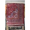 Image 1 : Large wool area carpet with center medallion, overall floral design with red background, highlights 