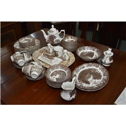 Set of Meakin ironstone dinnerware including setting for eight of dinner plates, side plates, cereal