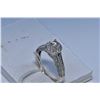 Image 1 : Ladies 14kt white gold and diamond ring with 0.24ct center diamond in a pave diamond setting. Total 