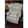 Image 1 : Modern wing back chair in checked upholstered with matching throw cushion made by Vogel