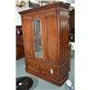 Image 1 : Antique Victorian mahogany wardrobe with four drawer base, two door and a center mirrored panel upp