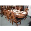 Image 1 : Walnut refractory style dining table with jack knife leaf and six dining chairs including one carver