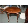 Image 1 : Small solid mahogany Gibbard occasional table on tall cabriole supports