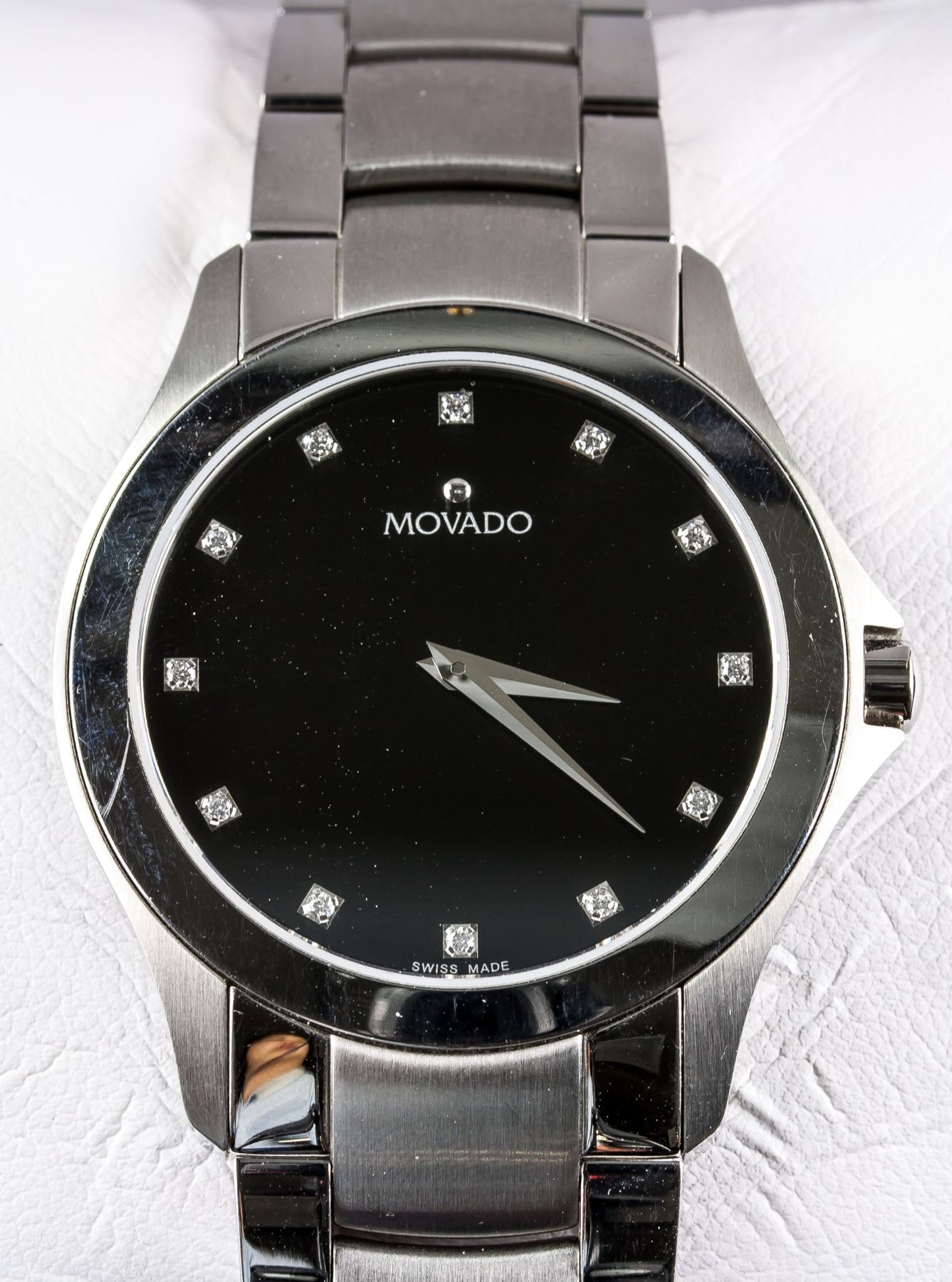 movado swiss made stainless steel water resistant sapphire crystal
