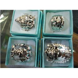LOT OF FOUR STEEL BIKER RINGS