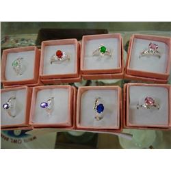 LOT OF EIGHT GEMSTONE RINGS