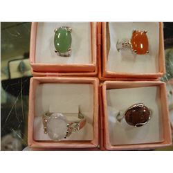 LOT OF FOUR GEMSTONE RINGS