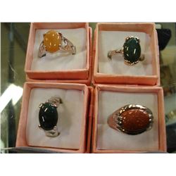 LOT OF FOUR GEMSTONE RINGS