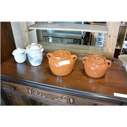 TWO MEDALTA BEAN CROCKS AND TWO POTTERY CANNISTERS