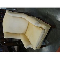 TAN UPHOLSTERED WINGBACK CHAIR