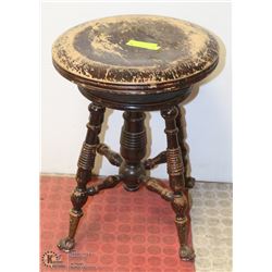 ANTIQUE PIANO STOOL WITH CLAW FEET, STAMPED