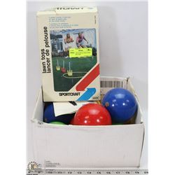 BOX OF BOCCE BALLS AND 4 NEW SAFE LAWN TOSS