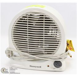 ELECTRIC HONEYWELL HEATER FAN - TAN COLOR.