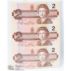 SHEET OF 3 UNCUT 1986 CANADIAN $2 BILLS.