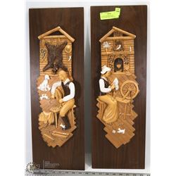 A PAIR OF PIONEER SCENE CHALKWARE WALL DISPLAYS