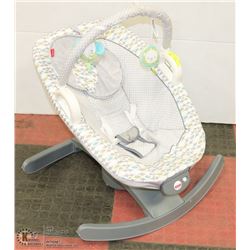 FISHER PRICE SWAYING ROCKING MACHINE.