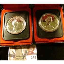Two Canada Dollars in original cases, 1976 & 1978, Both Silver.