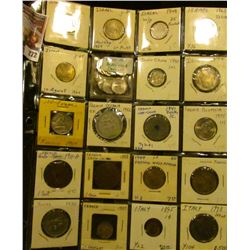 Plastic page with (14) various denomination Israel Coins, most of which are high grade; 1940 Indo Ch